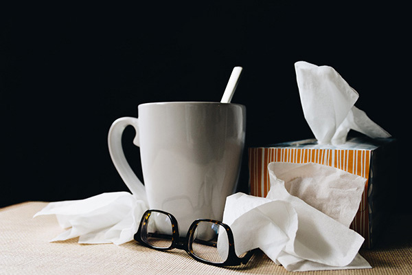 mug, glasses and tissues